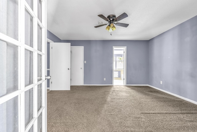 1736 Goshen Rd, Augusta, GA 30906 - carpeted empty room with french doors, a ceiling fan, and a textured ceiling
