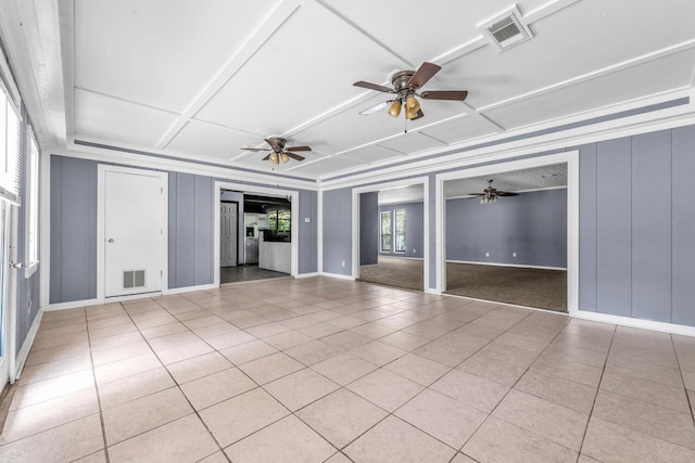 1736 Goshen Rd, Augusta, GA 30906 - unfurnished living room featuring coffered ceiling, a ceiling fan, and light tile patterned floors