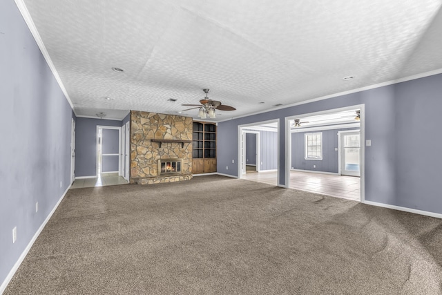 1736 Goshen Rd, Augusta, GA 30906 - unfurnished living room with carpet flooring, a ceiling fan, crown molding, and a fireplace