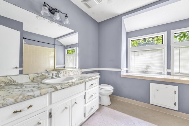 1736 Goshen Rd, Augusta, GA 30906 - full bathroom featuring vanity, plenty of natural light, and tile patterned floors