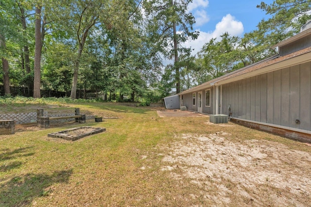 1736 Goshen Rd, Augusta, GA 30906 - view of grassy yard with a garden