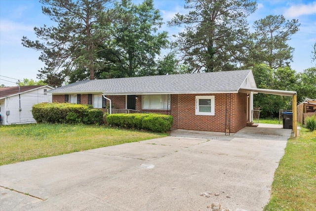 1711 Greenway Dr, Augusta, GA 30909 - ranch-style house featuring roof with shingles, a front yard, driveway, and brick siding