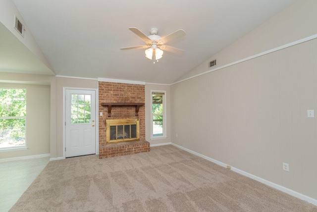 112 W Lynne Dr, Augusta, GA 30907 - unfurnished living room featuring vaulted ceiling, plenty of natural light, ceiling fan, and a fireplace