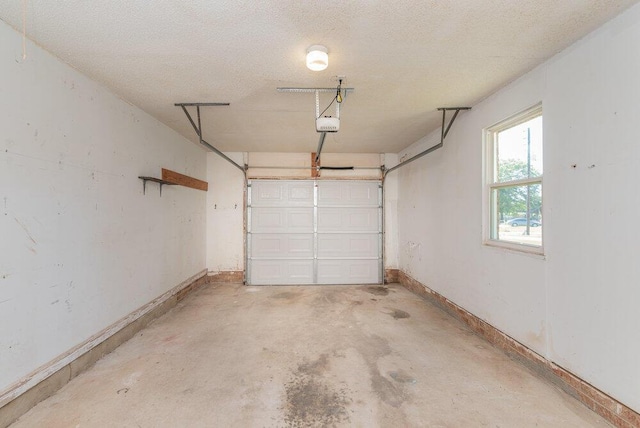 112 W Lynne Dr, Augusta, GA 30907 - garage with baseboards and a garage door opener