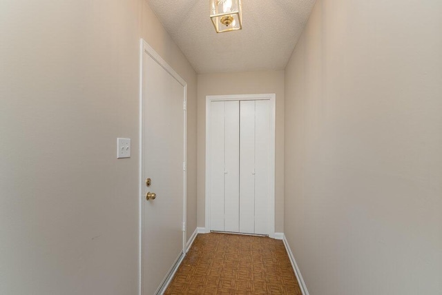 112 W Lynne Dr, Augusta, GA 30907 - corridor with baseboards and a textured ceiling