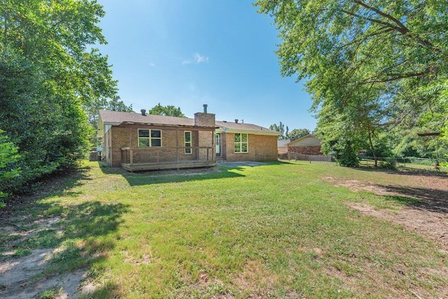 112 W Lynne Dr, Augusta, GA 30907 - back of property featuring brick siding and a chimney