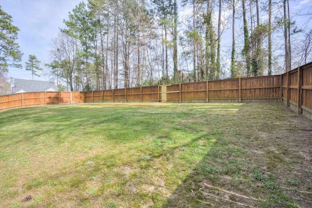 view of yard featuring a fenced backyard