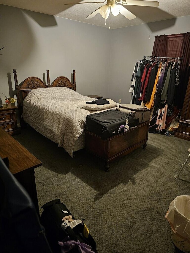 carpeted bedroom with a ceiling fan