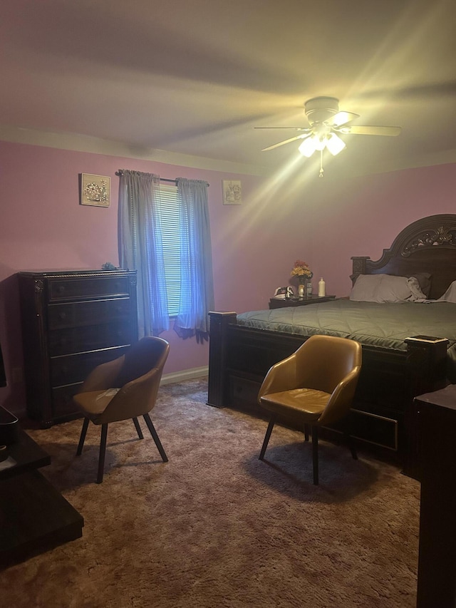 carpeted bedroom with a ceiling fan