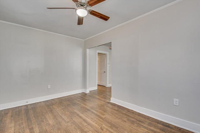 unfurnished room with hardwood / wood-style flooring, ceiling fan, and crown molding