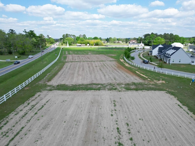 view of property's community with fence