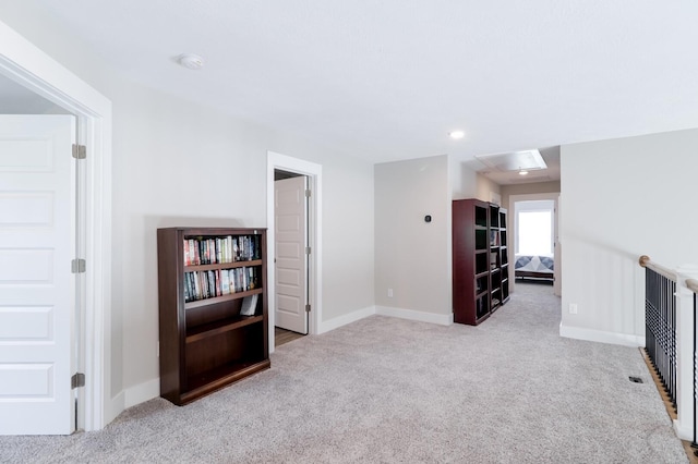 interior space with recessed lighting and baseboards