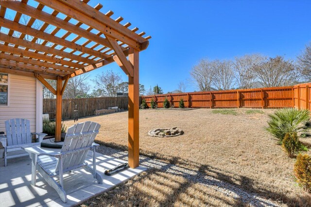 view of patio with a fenced backyard and a pergola