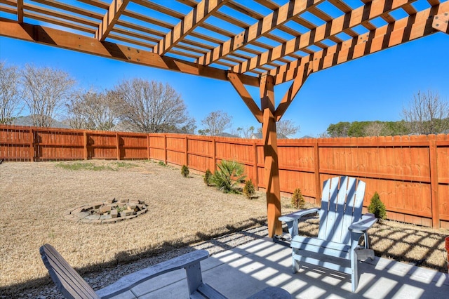 view of patio featuring a fenced backyard and a pergola