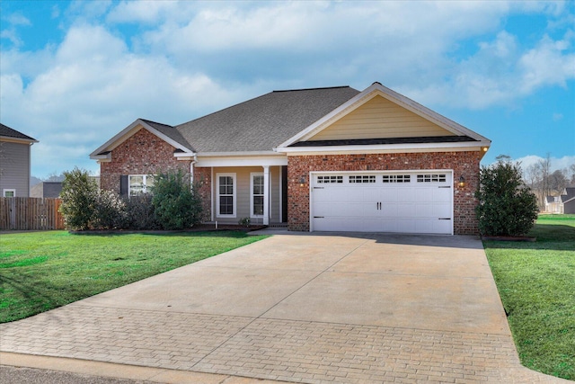 view of front of property featuring a garage, concrete driveway, fence, a front lawn, and brick siding