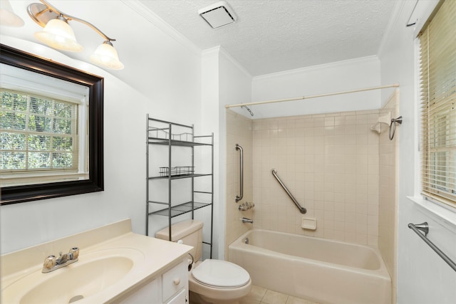 full bathroom with toilet, a textured ceiling, vanity, crown molding, and tiled shower / bath combo