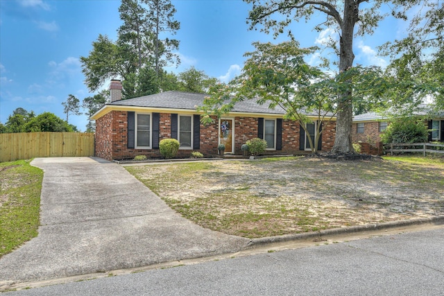 522 Gray Dr, Martinez, GA 30907 - ranch-style home with a chimney, concrete driveway, brick siding, and a shingled roof