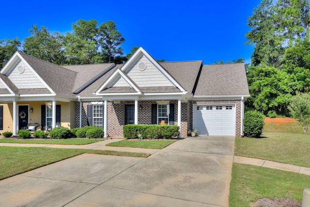 view of front facade with a garage and a front yard