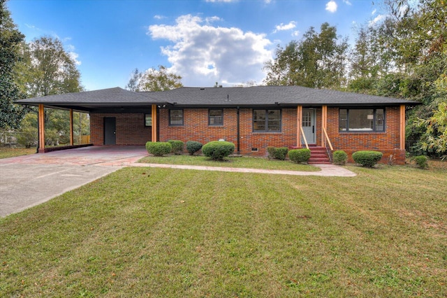 ranch-style house featuring a front lawn and a carport