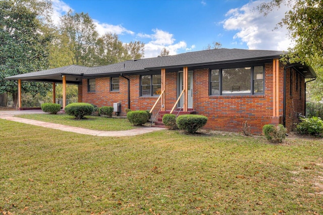 ranch-style house with a front lawn