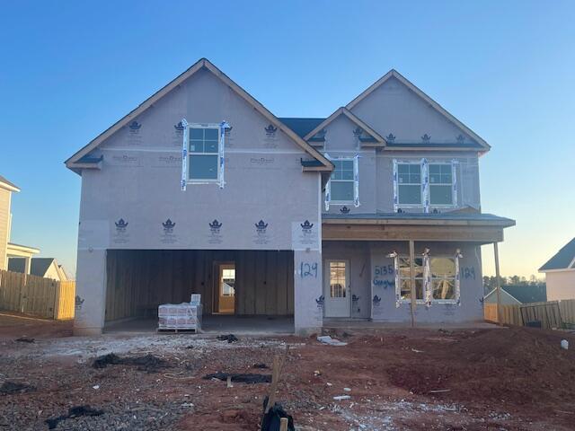 view of front facade with a garage and a front yard