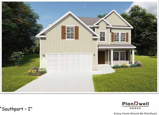 view of front facade with a garage and a front yard