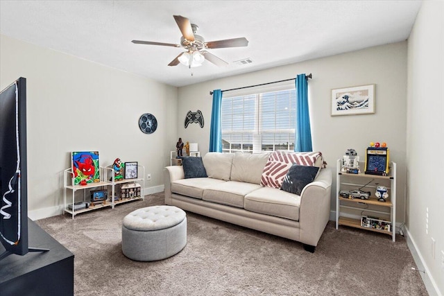 carpeted living area featuring visible vents, a ceiling fan, and baseboards