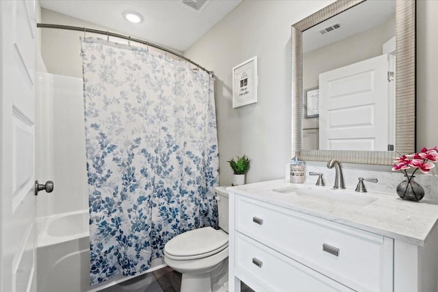 full bath featuring vanity, toilet, shower / bathtub combination with curtain, and visible vents