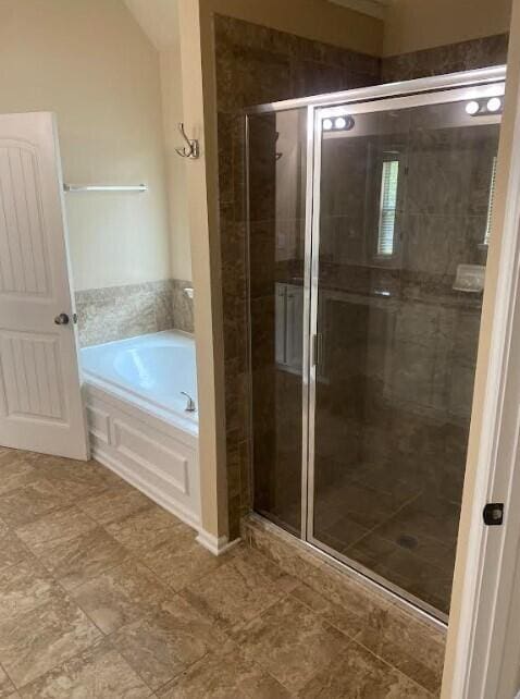 6066 Reynolds Cir, Grovetown, GA 30813 - bathroom with a bath and a shower stall