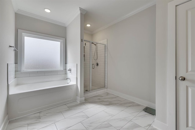 full bath with a garden tub, baseboards, crown molding, and a stall shower