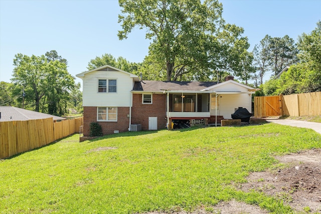2905 Rocky Creek Rd, Augusta, GA 30906 - rear view of property with a lawn, a gate, fence, and brick siding