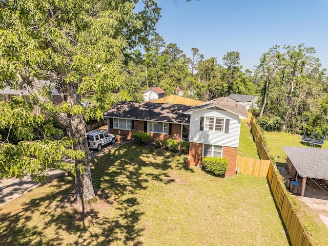 2905 Rocky Creek Rd, Augusta, GA 30906 - split level home featuring brick siding, a front yard, and fence