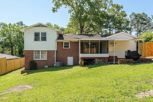 2905 Rocky Creek Rd, Augusta, GA 30906 - rear view of house with roof with shingles, a yard, fence private yard, and brick siding