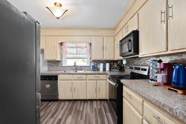 2905 Rocky Creek Rd, Augusta, GA 30906 - kitchen featuring a textured ceiling, decorative backsplash, stainless steel appliances, a sink, and light brown cabinetry