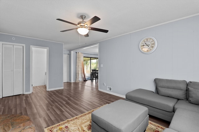 2905 Rocky Creek Rd, Augusta, GA 30906 - living area with crown molding, ceiling fan, and wood finished floors