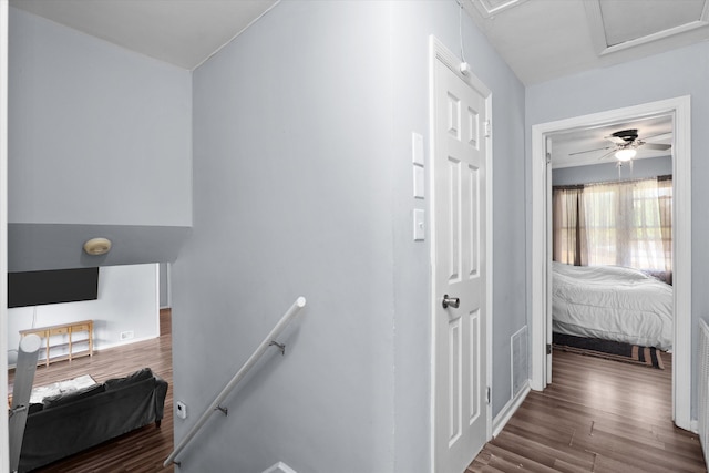 2905 Rocky Creek Rd, Augusta, GA 30906 - hall featuring visible vents, baseboards, an upstairs landing, attic access, and wood finished floors