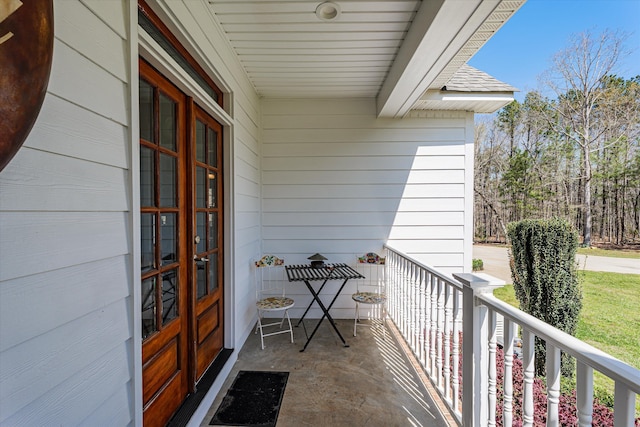 balcony featuring french doors