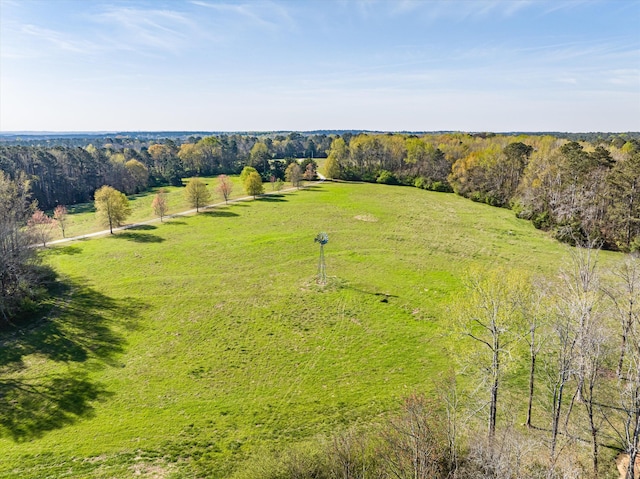 birds eye view of property featuring a rural view