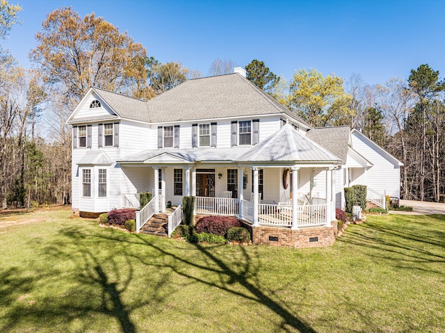 view of front of home with a porch and a front lawn