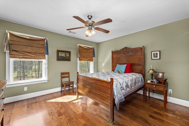 bedroom featuring hardwood / wood-style floors and ceiling fan