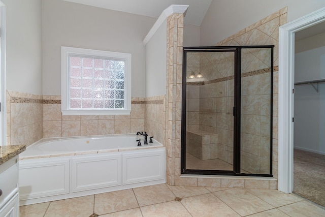 5191 Windmill Pl, Evans, GA 30809 - full bath with a garden tub, a shower stall, vanity, lofted ceiling, and tile patterned flooring