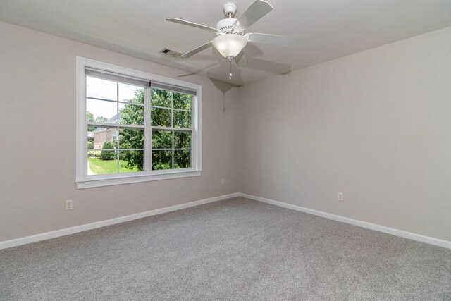 5191 Windmill Pl, Evans, GA 30809 - carpeted spare room featuring baseboards and ceiling fan