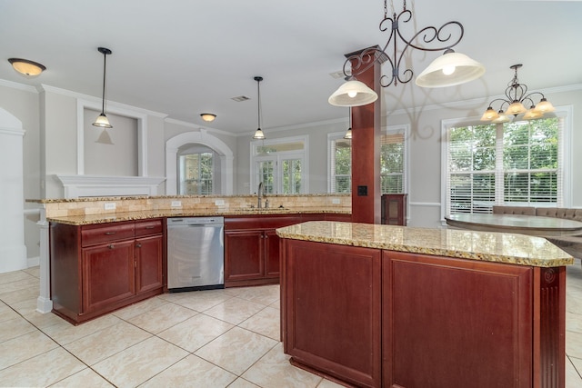 5191 Windmill Pl, Evans, GA 30809 - kitchen featuring stainless steel dishwasher, reddish brown cabinets, crown molding, a center island, and hanging light fixtures