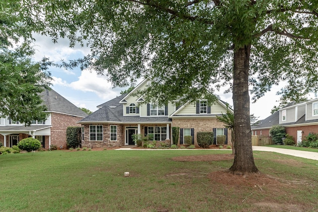 5191 Windmill Pl, Evans, GA 30809 - traditional home with a front yard and brick siding