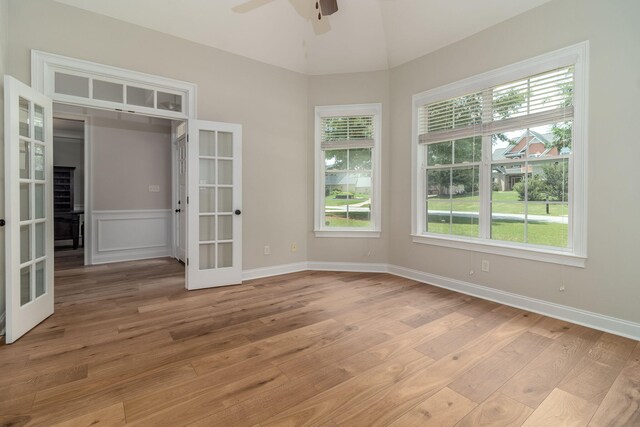 5191 Windmill Pl, Evans, GA 30809 - spare room featuring french doors, light wood finished floors, and a ceiling fan