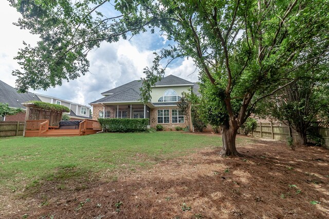 5191 Windmill Pl, Evans, GA 30809 - back of house with a wooden deck, brick siding, and a sunroom