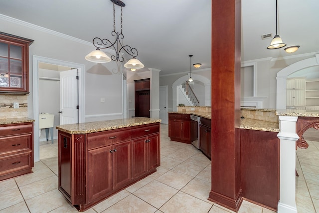 5191 Windmill Pl, Evans, GA 30809 - kitchen with dark brown cabinets, stainless steel dishwasher, crown molding, decorative backsplash, and light tile patterned floors
