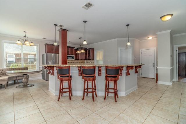 5191 Windmill Pl, Evans, GA 30809 - kitchen featuring stainless steel appliances, crown molding, light tile patterned flooring, and light stone counters