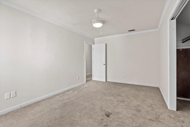 227 Waters Way, Martinez, GA 30907 - unfurnished bedroom featuring carpet floors, crown molding, a textured ceiling, and baseboards