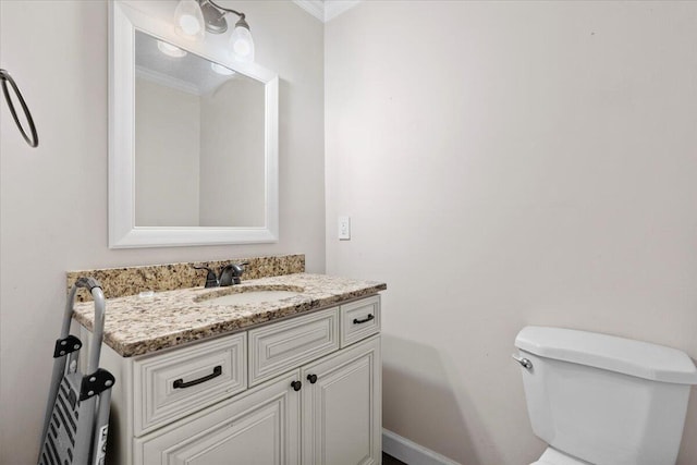 227 Waters Way, Martinez, GA 30907 - bathroom with toilet, vanity, crown molding, and baseboards